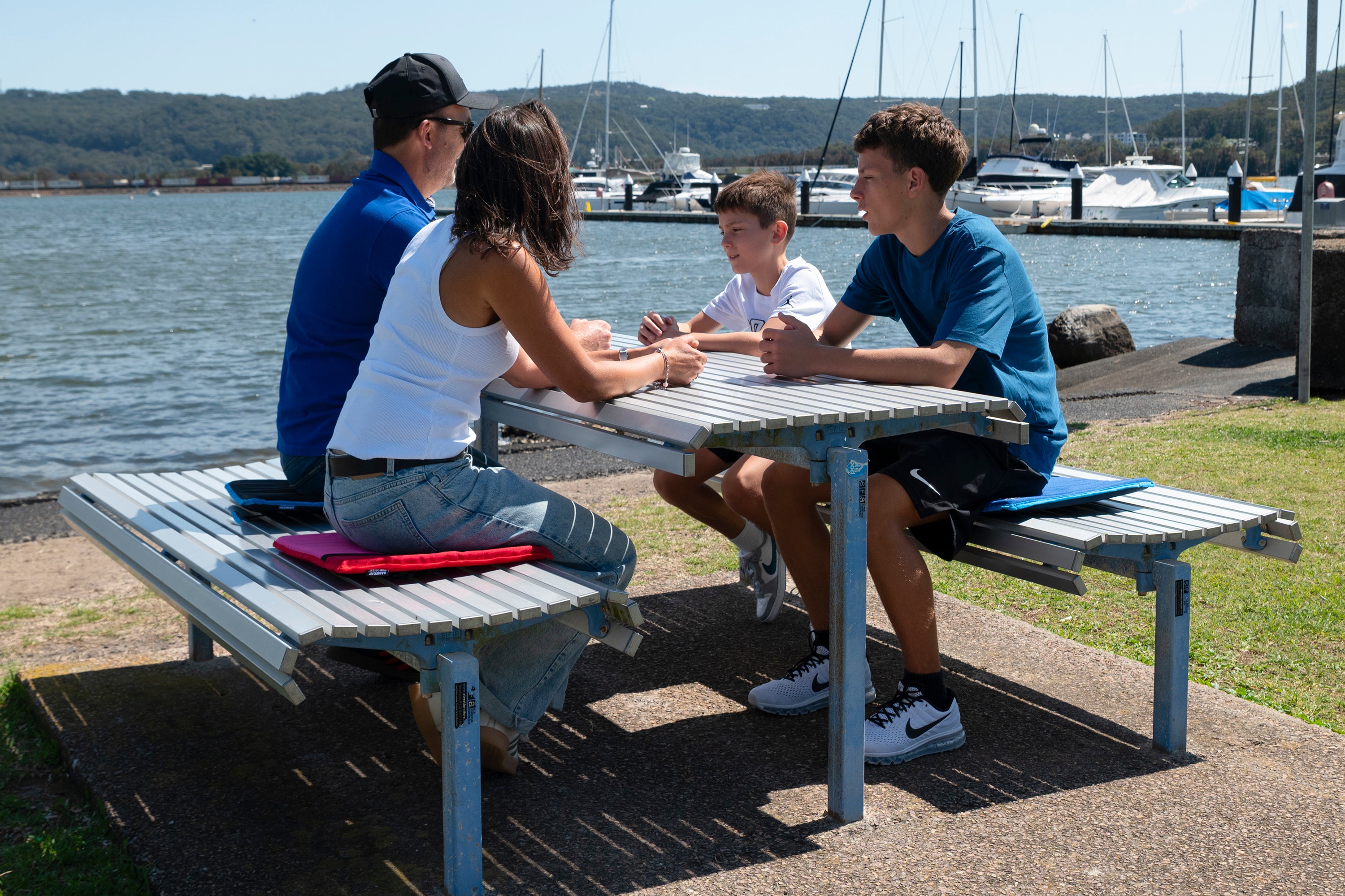 family picnic, stadium seat with strap, waterproof stadium cushion, lightweight sports seat, comfortable bleacher seat pad, best portable seat for game day, sports bench cushion, stadium seat Australia, bleacher back support seat, roll up stadium seat